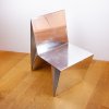 Metallsessel aus nur einer Platte 